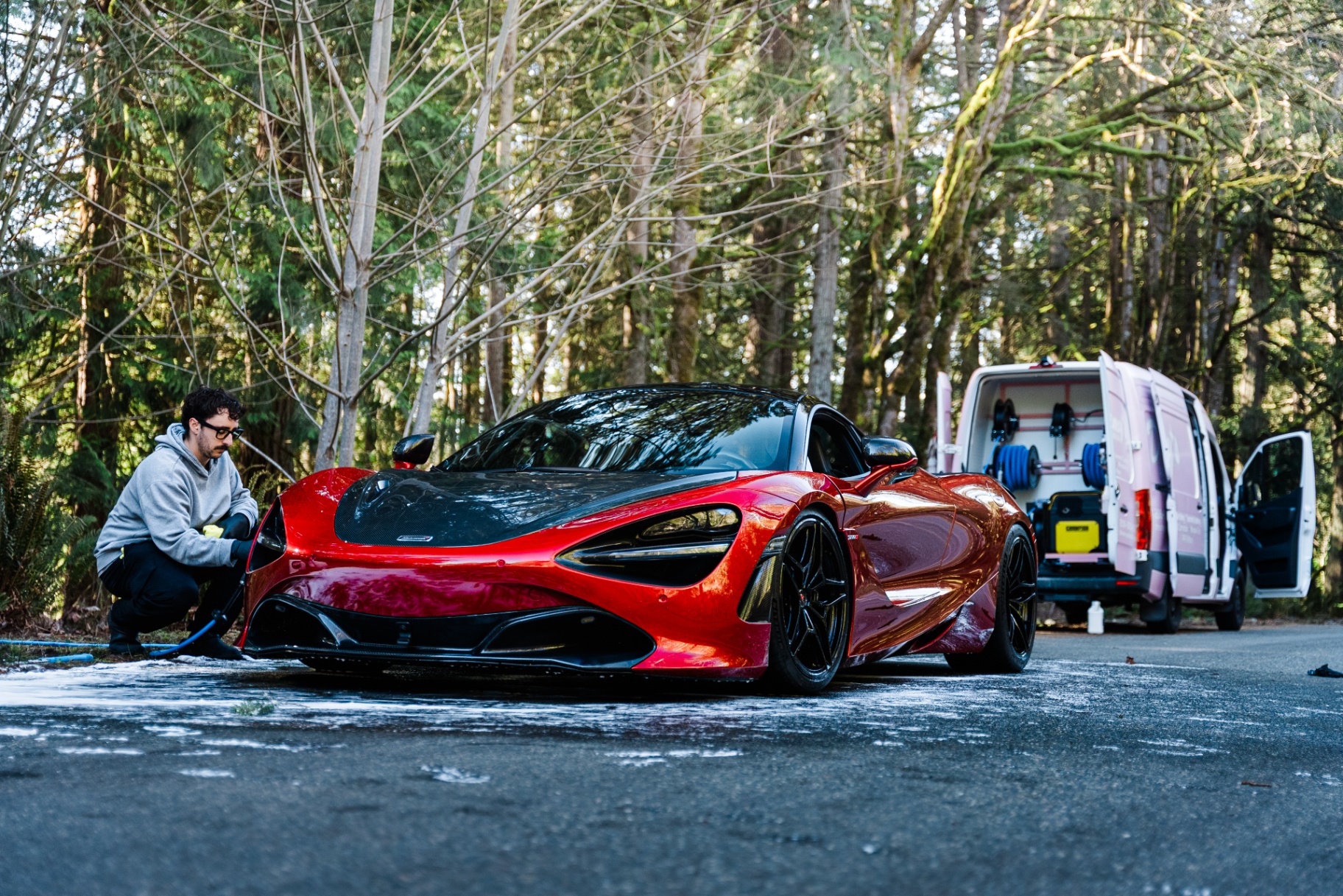Red McLaren 720S foam wash by Dreamy's mobile detailing team